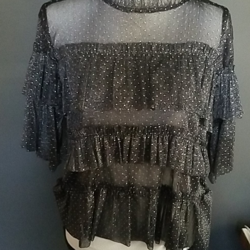 Adorable Ruffled top.